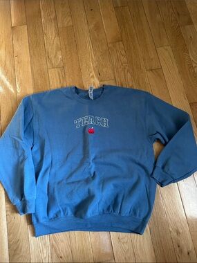 Gildan Blue Crewneck Sweatshirt with Red Apple 'TEACH' Graphic